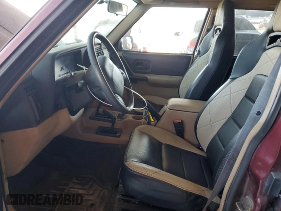 2000 Jeep Cherokee Classic with VIN 1J4FF58S8YL135534, listed as a Copart auction lot 62211335 with 108,888 mi miles and Salvage title. Bid and sale history available at DreamBid. Image 7.