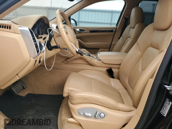 2014 Porsche Cayenne S with VIN WP1AB2A25ELA58233, listed as a Copart auction lot 52733455 with 144,344 mi miles and Clean title. Bid and sale history available at DreamBid. Image 7.