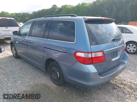 2007 Honda Odyssey EX with VIN 5FNRL38457B037239, listed as a IAAI auction lot 42034219 with 291,885 mi miles. Bid and sale history available at carsss.com. Image 3.