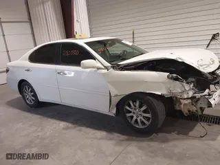 2002 Lexus ES 300 with VIN JTHBF30G825014674, listed as a IAAI auction lot 41805330 with 228,888 mi miles. Bid and sale history available at carsss.com. Image 14.