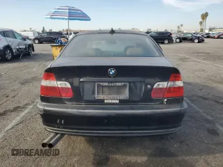 2002 BMW 3 Series 330i with VIN WBAEV53452KM00658, listed as a Copart auction lot 82062874 with 106,031 mi miles and Salvage Title. Bid and sale history available at carsss.com. Image 6.
