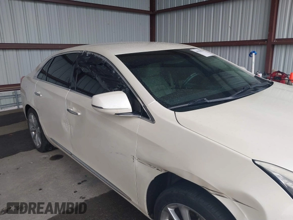 2014 Cadillac XTS Luxury with VIN 2G61M5S31E9210460, listed as a IAAI auction lot 41602087 with 1 mi miles. Bid and sale history available at carsss.com. Image 6.