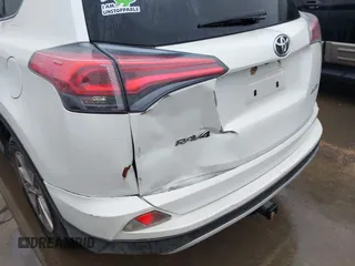 2016 Toyota RAV4 Limited with VIN JTMYFREV6GJ061593, listed as a IAAI auction lot 42188936 with 180,361 mi miles and . Bid and sale history available at DreamBid. Image 6.