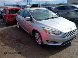 2017 Ford Focus Titanium with VIN 1FADP3N26HL309903, listed as a IAAI auction lot 41642306 with 107,762 mi miles and . Bid and sale history available at carsss.com. Image 1.