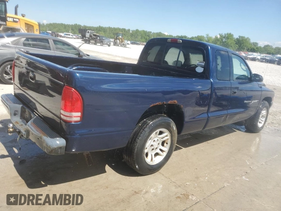 2001 Dodge Dakota z VIN 1B7GL22X91S338711, wystawiony jako Copart lot #54914095 z przebiegiem 200 216 mil mil oraz Szkoda całkowita • Salvage title. Historia ofert i sprzedaży dostępna na DreamBid. Obrazek 3.