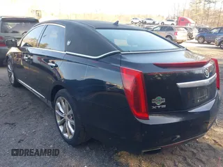 2013 Cadillac XTS Premium z VIN 2G61S5S38D9199459, wystawiony jako IAAI lot #41787638 z przebiegiem 171 298 mil mil oraz . Historia ofert i sprzedaży dostępna na DreamBid. Obrazek 3.