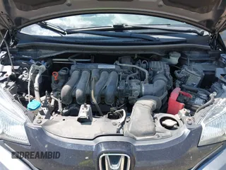 2015 Honda Fit LX with VIN 3HGGK5G57FM747786, listed as a IAAI auction lot 42656703 with 102,637 mi miles and . Bid and sale history available at DreamBid. Image 10.