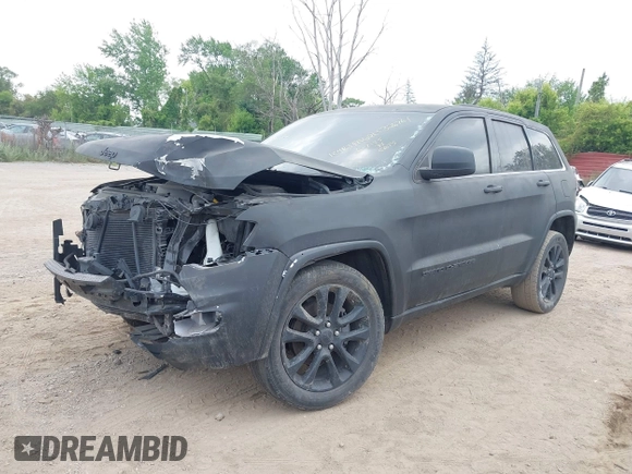 2020 Jeep Grand Cherokee Laredo E with VIN 1C4RJFAG2LC326761, listed as a IAAI auction lot 42434904 with 88,556 mi miles and . Bid and sale history available at DreamBid. Image 2.