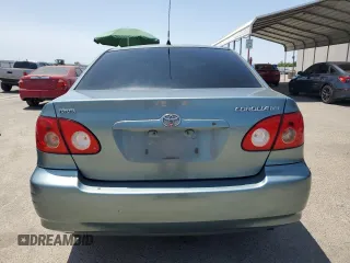 2006 Toyota Corolla CE with VIN 1NXBR32E56Z579489, listed as a Copart auction lot 62107695 with 198,269 mi miles and Salvage title. Bid and sale history available at DreamBid. Image 6.
