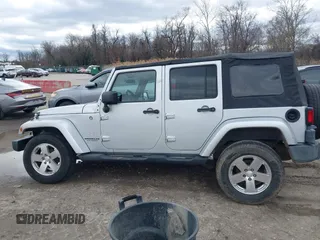 2008 Jeep Wrangler Unlimited Sahara with VIN 1J4GA59158L501099, listed as a IAAI auction lot 41743590 with 213,941 mi miles and . Bid and sale history available at DreamBid. Image 14.