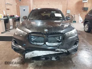 2020 BMW X1 xDrive28i z VIN WBXJG9C07L5P71792, wystawiony jako IAAI lot #41583132 z przebiegiem 150 095 mil mil oraz . Historia ofert i sprzedaży dostępna na DreamBid. Obrazek 12.