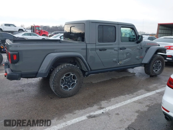 2022 Jeep Gladiator Mojave z VIN 1C6JJTEG8NL130971, wystawiony jako IAAI lot #41163074 z przebiegiem 47 142 mil mil oraz . Historia ofert i sprzedaży dostępna na DreamBid. Obrazek 14.