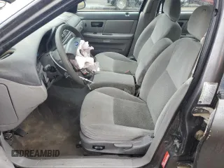 2005 Ford Taurus SE z VIN 1FAFP53U35A138592, wystawiony jako Copart lot #56176905 z przebiegiem Nie podano mil oraz Szkoda całkowita • Salvage title. Historia ofert i sprzedaży dostępna na DreamBid. Obrazek 7.
