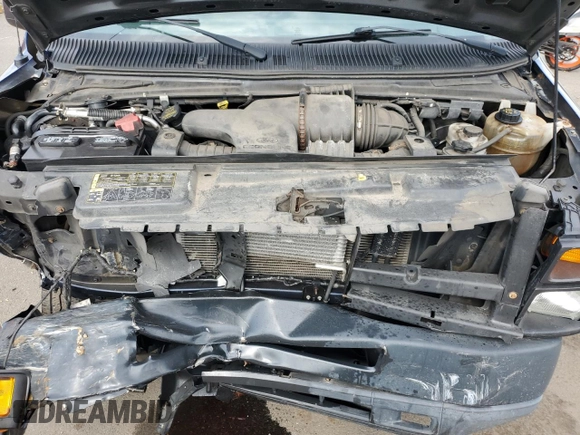 2011 Ford Econoline Passenger XL with VIN 1FMNE1BW2BDA00300, listed as a Copart auction lot 74028854 with 179,955 mi miles and Salvage Title. Bid and sale history available at DreamBid. Image 12.