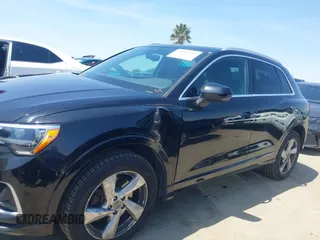 2019 Audi Q3 Premium with VIN WA1AECF33K1086047, listed as a IAAI auction lot 41905218 with 51,802 mi miles. Bid and sale history available at carsss.com. Image 14.