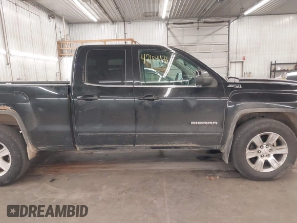2015 GMC Sierra 1500 SLE z VIN 1GTV2UEC0FZ224982, wystawiony jako IAAI lot #42184446 z przebiegiem 183 712 mil mil oraz . Historia ofert i sprzedaży dostępna na DreamBid. Obrazek 14.