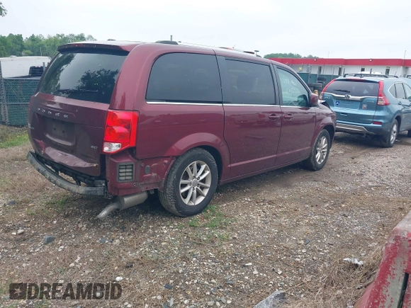 2018 Dodge Grand Caravan SXT z VIN 2C4RDGCG5JR305191, wystawiony jako IAAI lot #42269531 z przebiegiem 116 098 mil mil oraz . Historia ofert i sprzedaży dostępna na DreamBid. Obrazek 4.