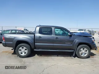 2014 Toyota Tacoma PreRunner with VIN 3TMJU4GN0EM164077, listed as a IAAI auction lot 41712542 with 69,443 mi miles. Bid and sale history available at carsss.com. Image 13.