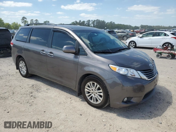 2012 Toyota Sienna XLE AAS with VIN 5TDYK3DCXCS199580, listed as a Copart auction lot 52455405 with 113,259 mi miles and Salvage Title. Bid and sale history available at DreamBid. Image 4.