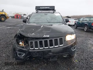 2015 Jeep Grand Cherokee Laredo with VIN 1C4RJFAGXFC602544, listed as a IAAI auction lot 41504666 with 190,170 mi miles. Bid and sale history available at carsss.com. Image 12.