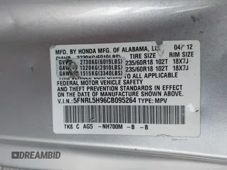 2012 Honda Odyssey Touring with VIN 5FNRL5H96CB095264, listed as a IAAI auction lot 41403450 with 246,199 mi miles and . Bid and sale history available at carsss.com. Image 9.