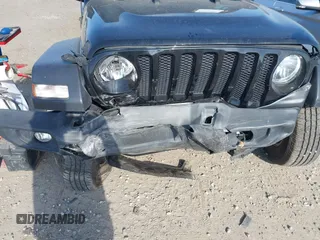 2021 Jeep Wrangler Sport S with VIN 1C4HJXAG6MW744998, listed as a IAAI auction lot 42170965 with 59,373 mi miles and . Bid and sale history available at DreamBid. Image 6.