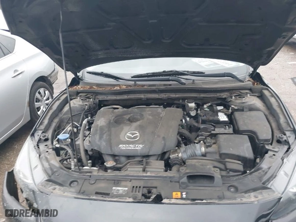 2018 Mazda Mazda3 4-Door Touring with VIN 3MZBN1V35JM243351, listed as a IAAI auction lot 41459525 with 55,765 mi miles. Bid and sale history available at carsss.com. Image 10.