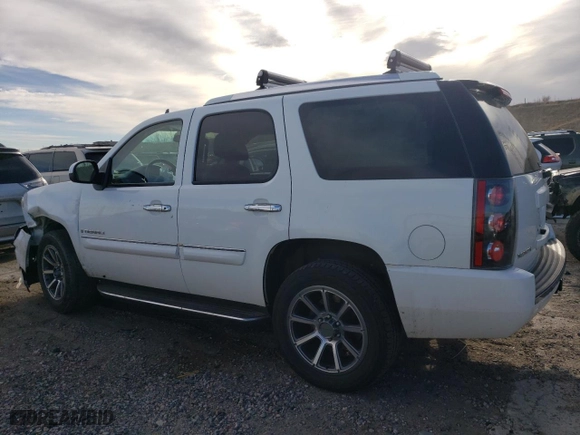 2008 GMC Yukon Denali with VIN 1GKFK63838J213866, listed as a Copart auction lot 49329765 with 143,550 mi miles and Salvage Title. Bid and sale history available at carsss.com. Image 2.