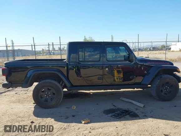 2022 Jeep Gladiator Mojave with VIN 1C6JJTEG7NL180485, listed as a IAAI auction lot 41030779 with 41,445 mi miles and . Bid and sale history available at DreamBid. Image 13.