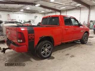 2013 Ram 1500 Sport with VIN 1C6RR7HT7DS516541, listed as a IAAI auction lot 41663993 with 176,831 mi miles and . Bid and sale history available at DreamBid. Image 4.