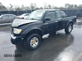 1998 Toyota Tacoma with VIN 4TAWN72N7WZ027838, listed as a IAAI auction lot 41717670 with 196,903 mi miles and . Bid and sale history available at DreamBid. Image 2.
