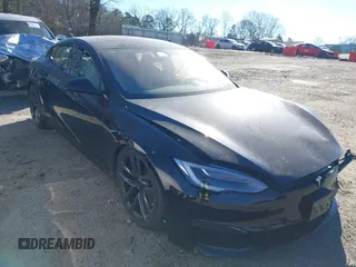 2021 Tesla Model S Long Range with VIN 5YJSA1E50MF438864, listed as a IAAI auction lot 41190778 with Not provided miles and . Bid and sale history available at DreamBid. Image 1.