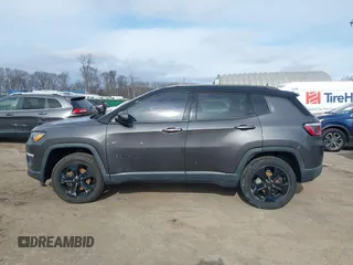 2019 Jeep Compass Latitude with VIN 3C4NJDBB4KT593022, listed as a IAAI auction lot 41627841 with 69,443 mi miles and . Bid and sale history available at DreamBid. Image 14.