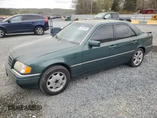 1995 Mercedes-Benz C 230/260/280/320 with VIN WDBHA28E3SF241951, listed as a Copart auction lot 50332845 with 236,068 mi miles and Salvage title. Bid and sale history available at DreamBid. Image 1.