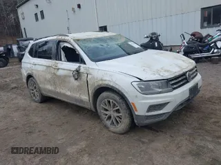2021 Volkswagen Tiguan SE with VIN 3VV2B7AX4MM009456, listed as a IAAI auction lot 41876861 with 72,203 mi miles and . Bid and sale history available at DreamBid. Image 1.