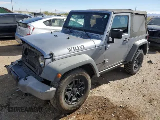 2015 Jeep Wrangler Willys Wheeler with VIN 1C4AJWAG0FL755639, listed as a Copart auction lot 79463034 with 158,656 mi miles and Salvage title. Bid and sale history available at DreamBid. Image 1.