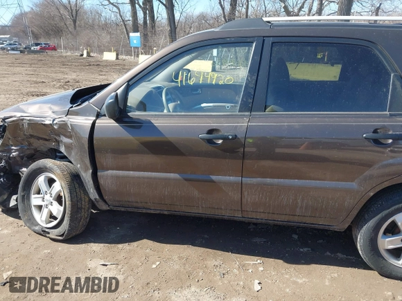 2010 Kia Sportage LX with VIN KNDKGCA32A7697677, listed as a IAAI auction lot 41694920 with 158,212 mi miles and . Bid and sale history available at carsss.com. Image 14.
