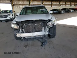 2014 Infiniti QX60 with VIN 5N1AL0MM6EC507768, listed as a Copart auction lot 64648255 with 131,395 mi miles and Salvage title. Bid and sale history available at DreamBid. Image 5.