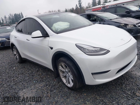 2022 Tesla Model Y Long Range z VIN 7SAYGDEE6NF451259, wystawiony jako IAAI lot #41200775 z przebiegiem 59 683 mil mil oraz . Historia ofert i sprzedaży dostępna na DreamBid. Obrazek 1.