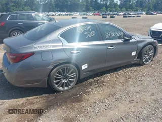 2018 Infiniti Q50 Red Sport 400 with VIN JN1FV7AP7JM461628, listed as a IAAI auction lot 42622062 with 58,561 mi miles and . Bid and sale history available at DreamBid. Image 4.