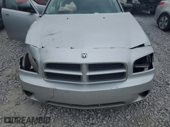 2008 Dodge Charger z VIN 2B3KA43GX8H248254, wystawiony jako Copart lot #55070915 z przebiegiem 196 269 mil mil oraz Szkoda całkowita • Salvage title. Historia ofert i sprzedaży dostępna na DreamBid. Obrazek 11.