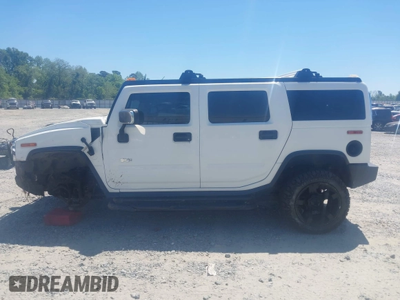2003 Hummer H2 z VIN 5GRGN23U53H102215, wystawiony jako IAAI lot #42054023 z przebiegiem 222 170 mil mil oraz . Historia ofert i sprzedaży dostępna na DreamBid. Obrazek 14.