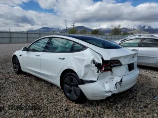 2023 Tesla Model 3 with VIN 5YJ3E1EA9PF569835, listed as a Copart auction lot 50876824 with 25,736 mi miles and Salvage Title. Bid and sale history available at DreamBid. Image 2.