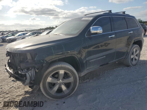 2015 Jeep Grand Cherokee Overland with VIN 1C4RJFCG6FC919637, listed as a Copart auction lot 52072925 with 111,552 mi miles and Salvage Title. Bid and sale history available at carsss.com. Image 1.