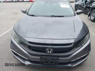 2020 Honda Civic LX with VIN 2HGFC2F63LH530442, listed as a IAAI auction lot 42071650 with 38,520 mi miles and . Bid and sale history available at DreamBid. Image 12.