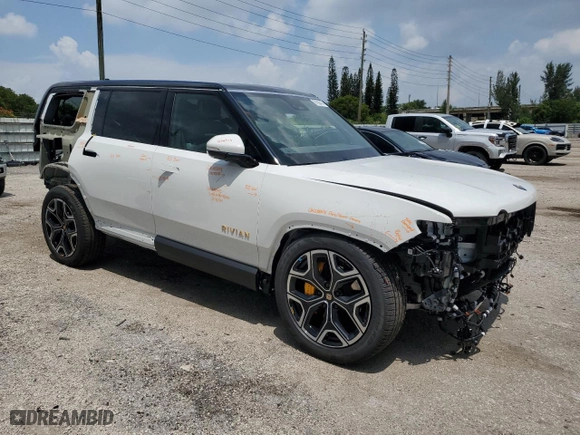 2023 Rivian R1S Adventure with VIN 7PDSGABA7PN021756, listed as a Copart auction lot 67650414 with 3,284 mi miles and Salvage Title. Bid and sale history available at carsss.com. Image 4.