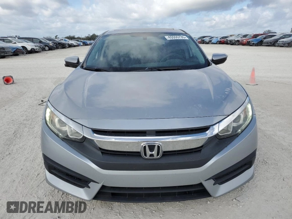 2016 Honda Civic EX with VIN 19XFC2F74GE059765, listed as a Copart auction lot 45555735 with 48,643 mi miles and Salvage Title. Bid and sale history available at DreamBid. Image 5.
