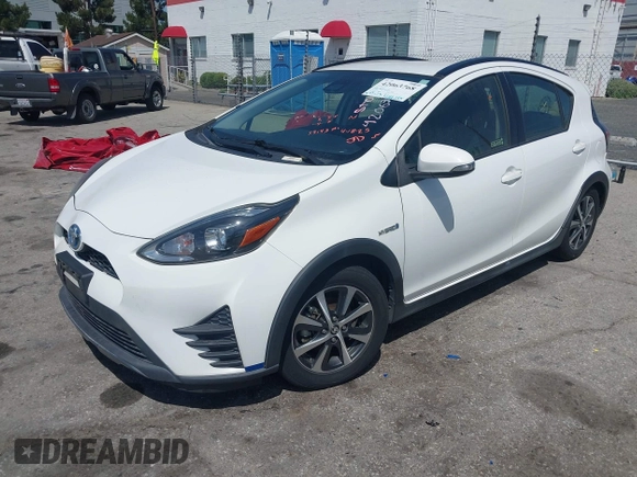 2018 Toyota Prius One with VIN JTDKDTB33J1613019, listed as a IAAI auction lot 42063768 with 59,143 mi miles and . Bid and sale history available at DreamBid. Image 2.
