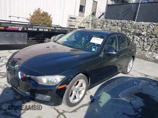 2015 BMW 3 Series 328i with VIN WBA3C1C53FK120984, listed as a IAAI auction lot 41338035 with 119,486 mi miles and . Bid and sale history available at carsss.com. Image 2.