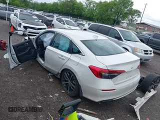 2024 Honda Civic Touring z VIN 2HGFE1F93RH341247, wystawiony jako IAAI lot #42102894 z przebiegiem Nie podano mil oraz . Historia ofert i sprzedaży dostępna na DreamBid. Obrazek 3.
